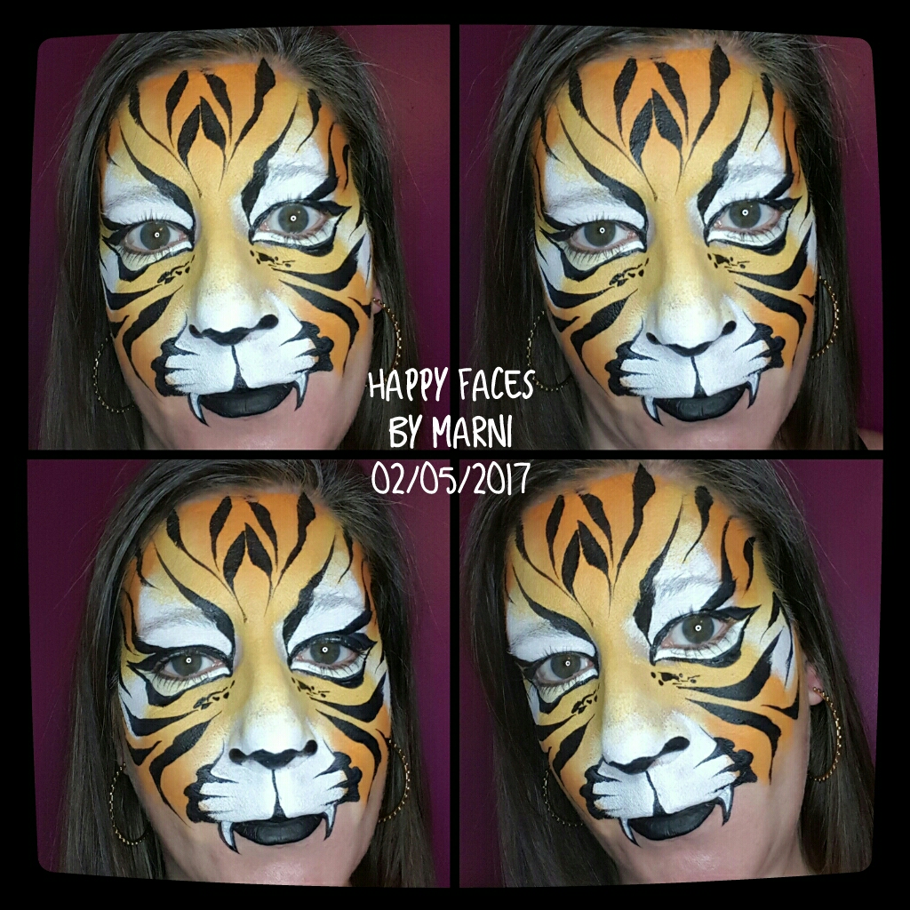 Roaring Tiger face paint design by Happy Faces by Marni, Calgary